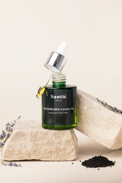 Woman's hands holding a clear bottle